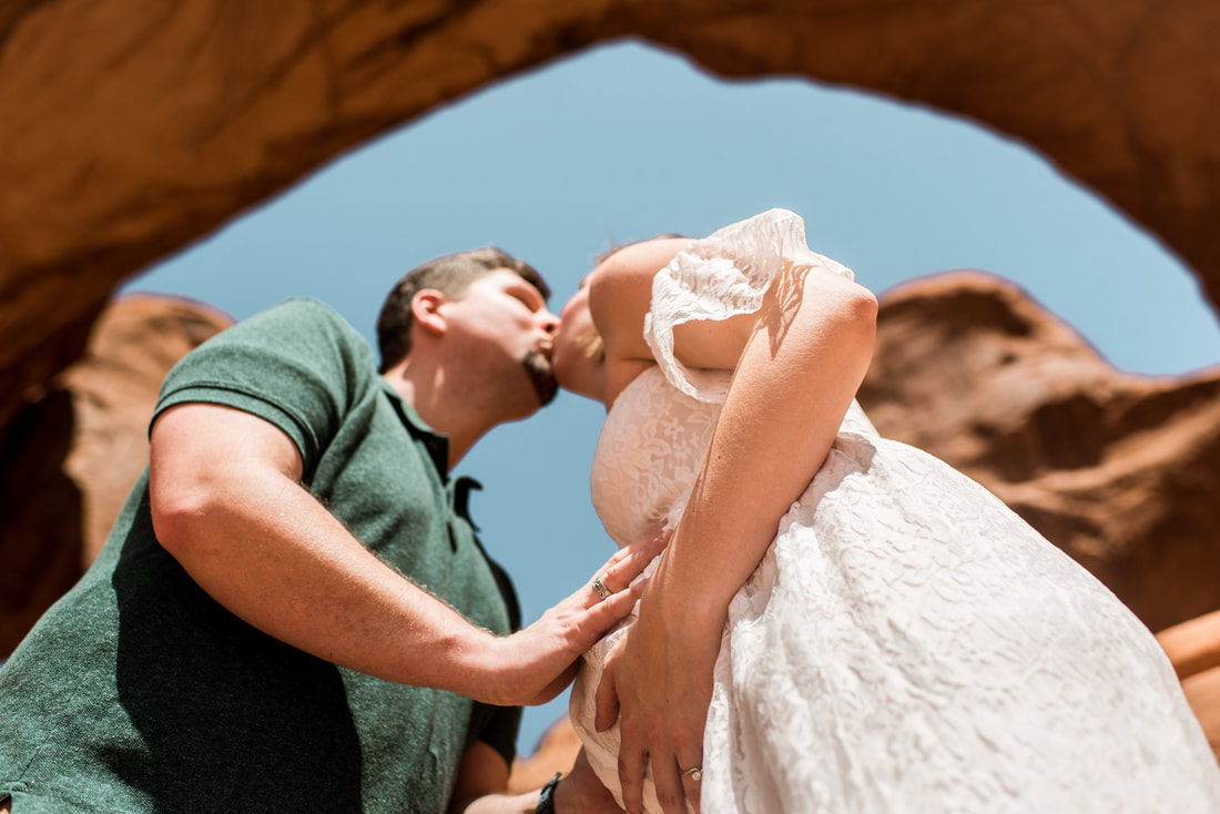 Link to blog of adventure maternity session in Arches National Park, Moab, Utah